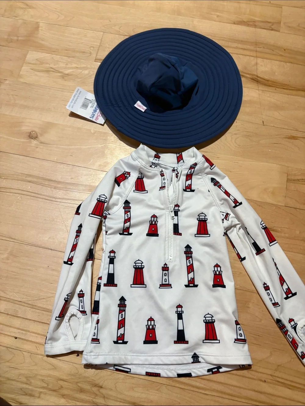Monica and Andy 12m  White Rash Guard Red & Black Lighthouse Print rufflebutt ha
